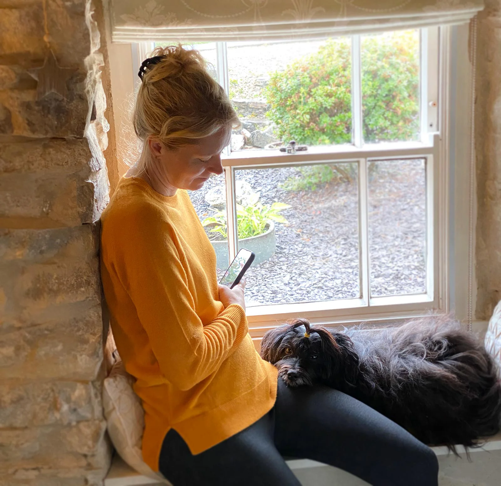 Melanie Phillips with her dog Lily in my cottage.